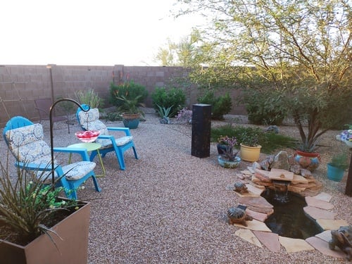 colorful outdoor furniture and pond